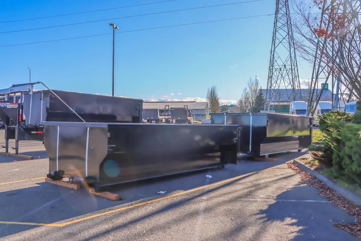 Roll-off dumpster ready for waste disposal at job site for 6 Yard Dumpster Rental in Wayne